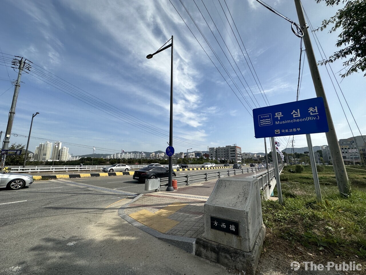 무심천은 국가하천이라는 표지판 그러나 홈페이지는 여전히 지방하천이라고 표기. /오홍지 기자