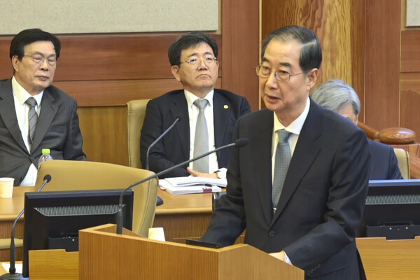  한덕수 국무총리가 19일 서울 헌법재판소에 진행된 탄핵심판 첫 변론기일에 출석해 발언하고 있다. [연합뉴스]